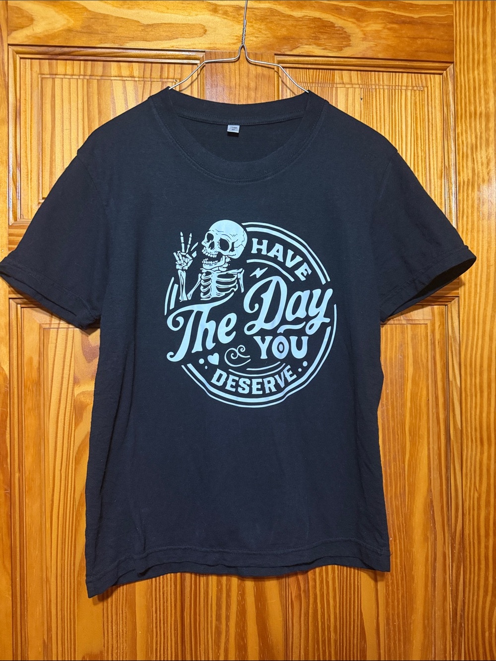 Black Graphic Tee with Light Blue Skull Design - "Have The Day You Deserve"